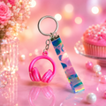 Teal Headphones and Holographic Pattern Keychain