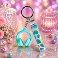Teal Headphones and Holographic Pattern Keychain