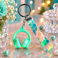 Teal Headphones and Holographic Pattern Keychain